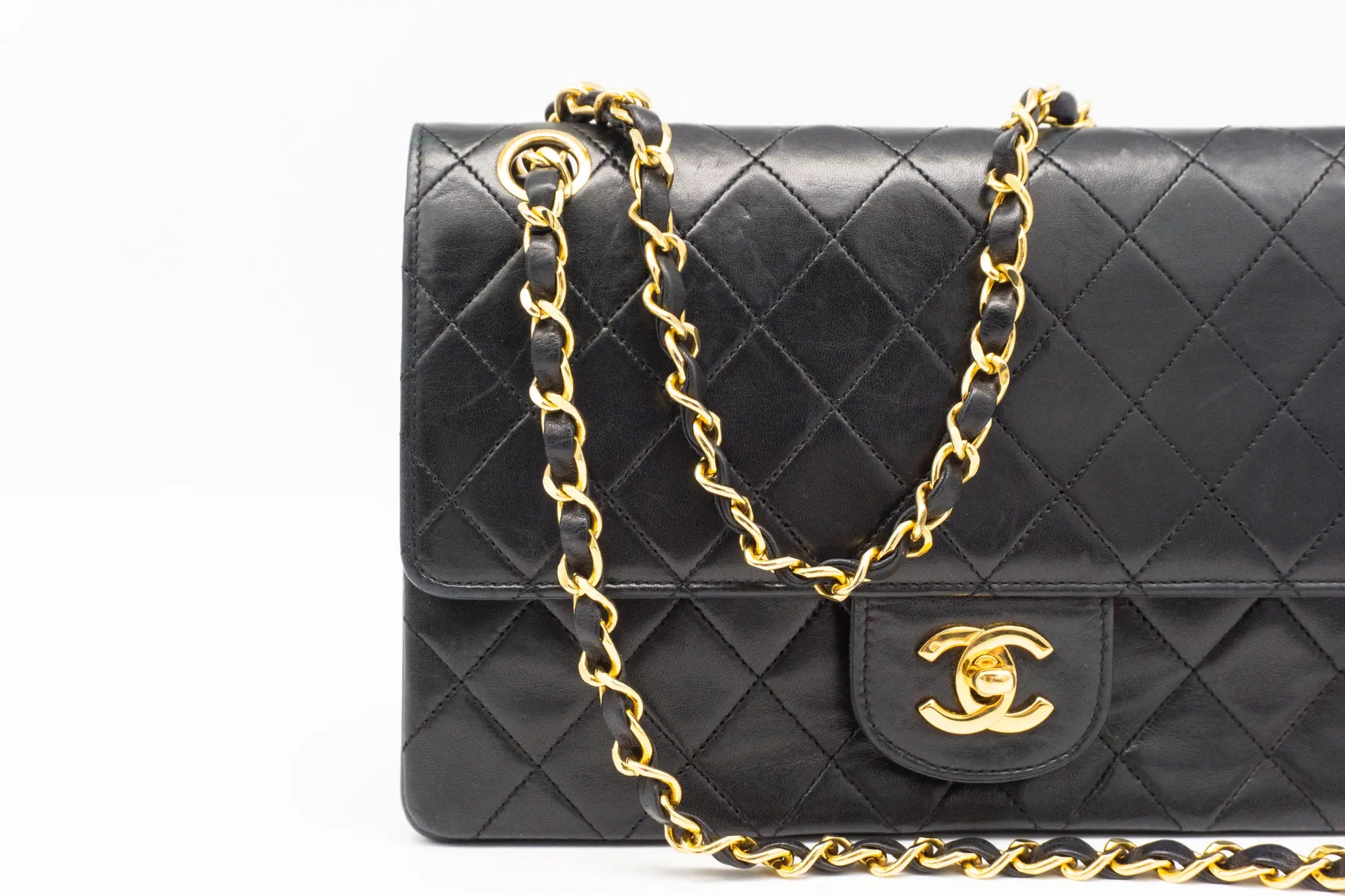 Chanel Medium Classic Flap in black front view cut