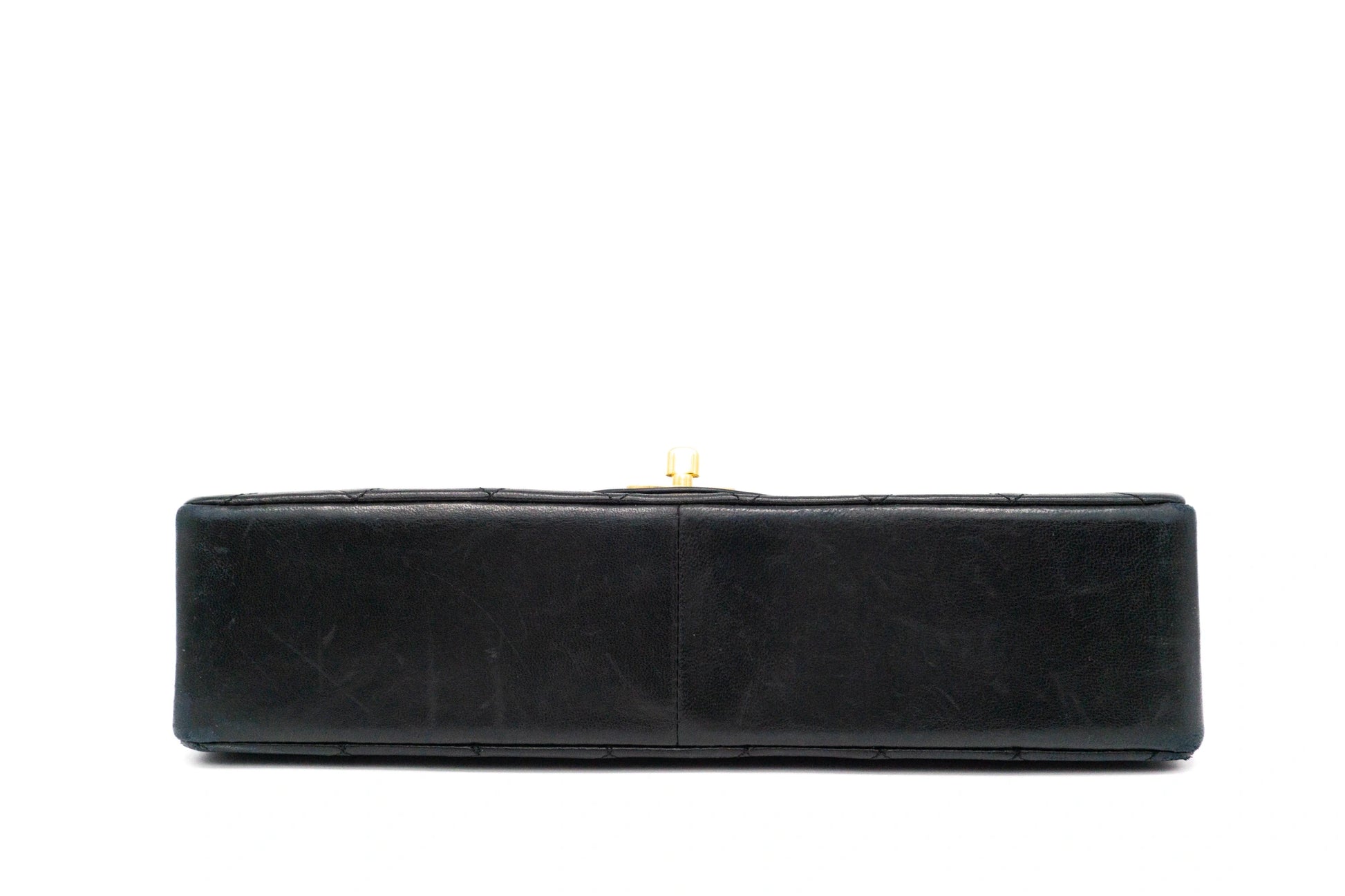 Chanel Medium Classic Flap in black bottom view