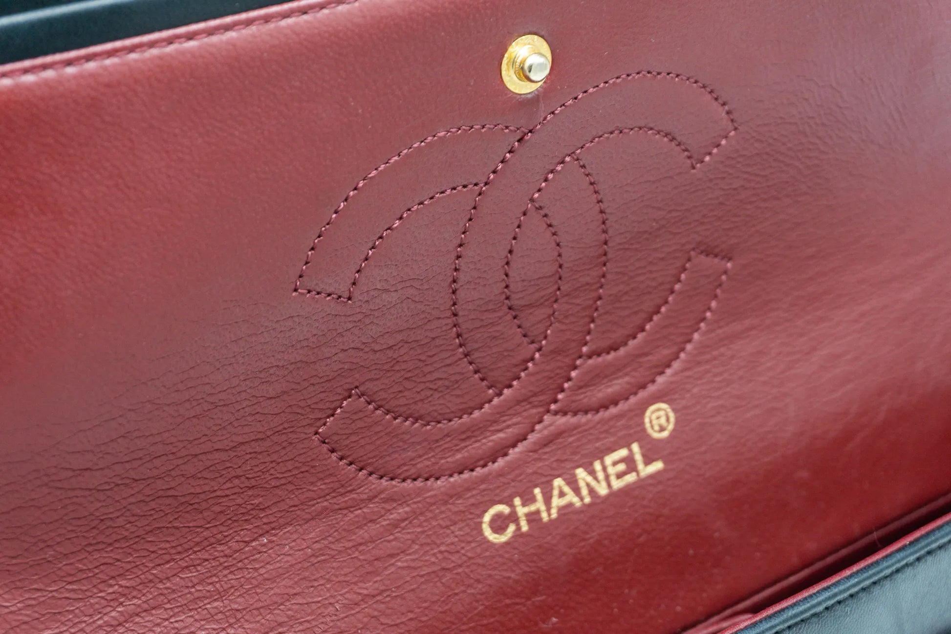 Chanel Medium Classic Flap in black inner CC Chanel logo detail