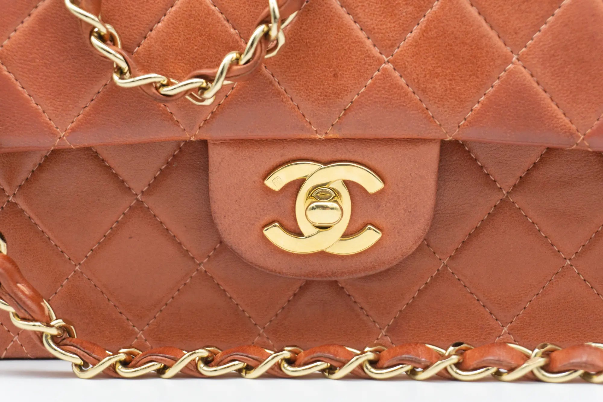 Chanel Medium Classic Flap in rust red outer CC turnlock detail