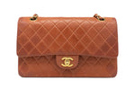 Chanel Medium Classic Flap in brique red front view